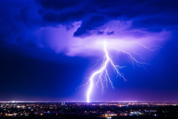 Majestic Lightning Strike Over Cityscape