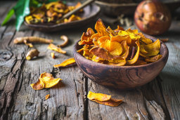 a bowl of dried vegetable chips