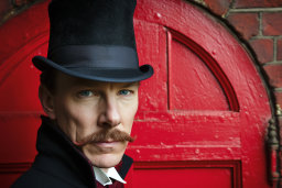 a man with a mustache and top hat