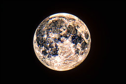 a full moon with many spots on it