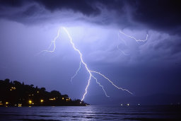 Lightning Strike Over Coastal Town