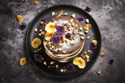 Gourmet Pancake Stack with Edible Flowers