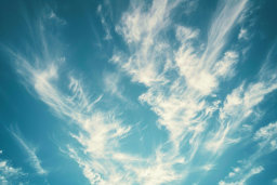 Wispy Clouds in a Blue Sky