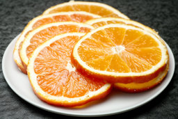 Sliced Oranges on a Plate