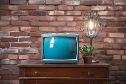 Retro Television and Modern Lamp