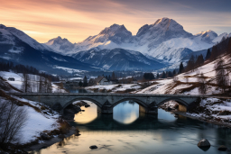 un pont sur une rivière avec des montagnes couvertes de neige en arrière-plan