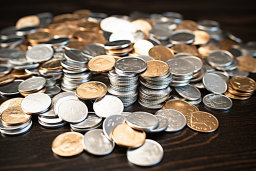 a pile of coins on a table